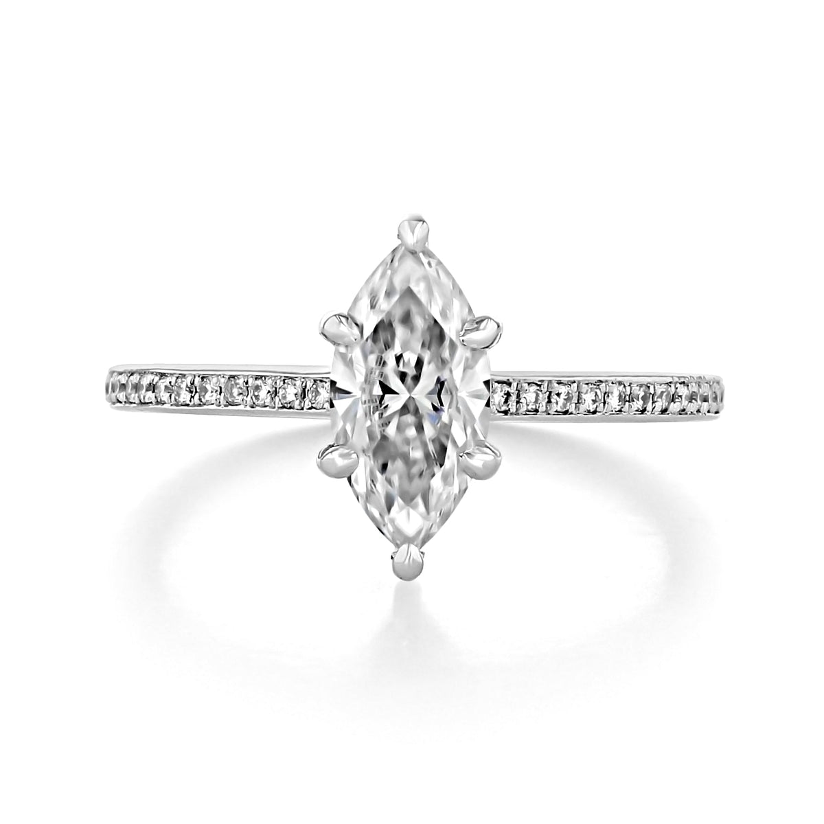 Marquise-cut solitaire engagement ring with a pavé-set band in a silver-colored metal.