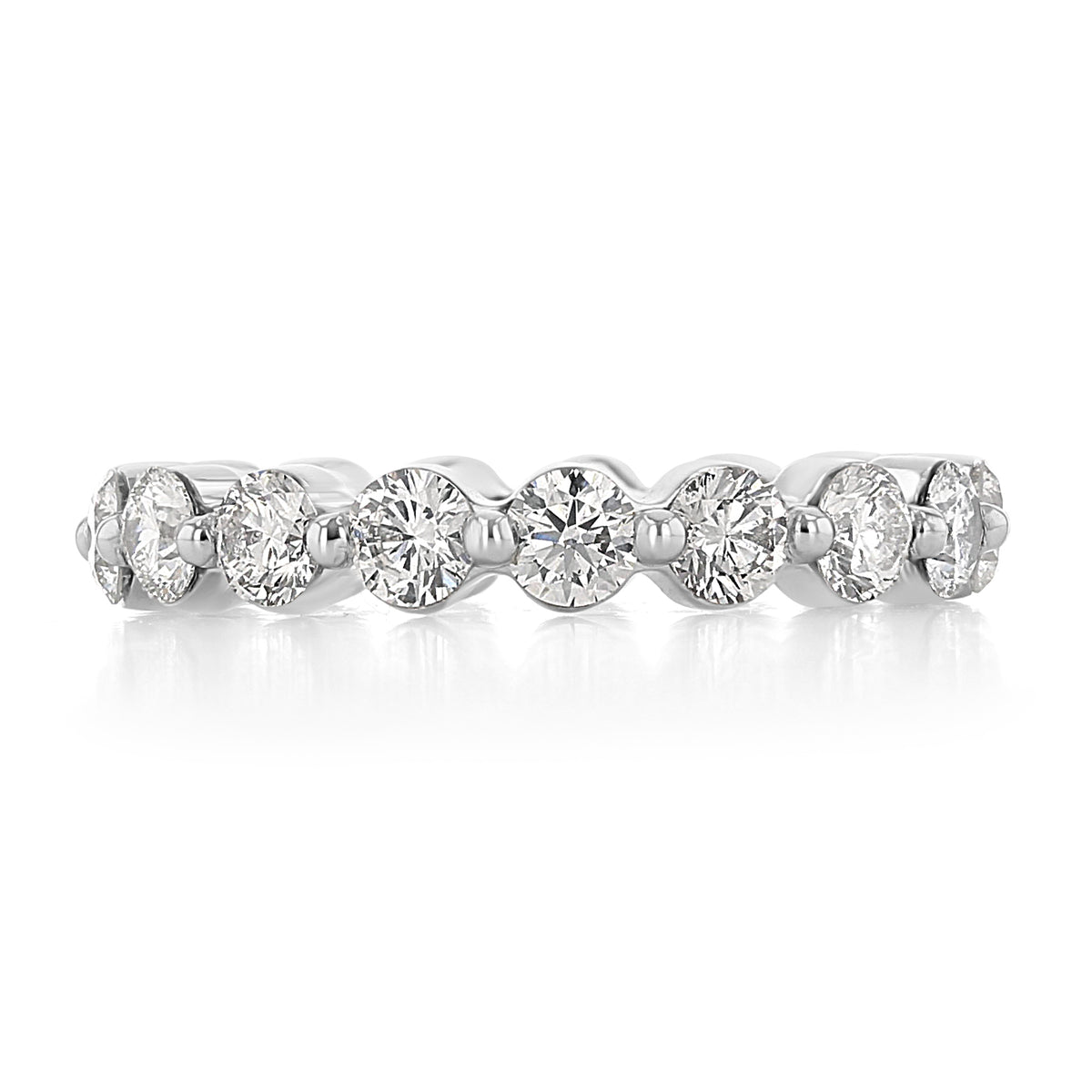 Maribel single prong diamond wedding band in 14k white gold, featuring a row of round-cut lab-grown diamonds held by single prongs.