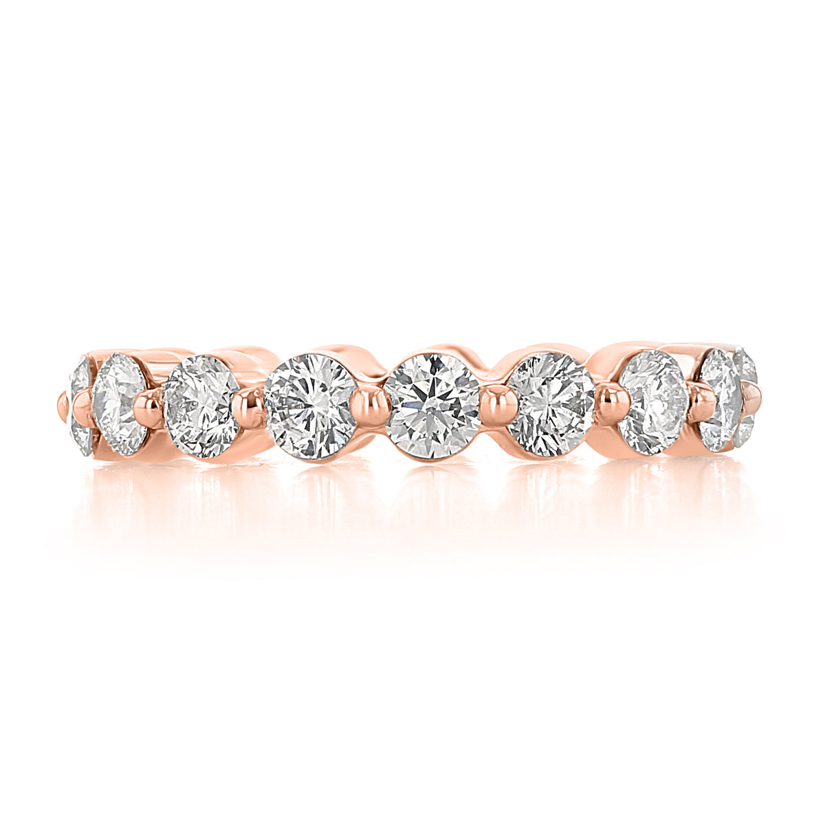 Maribel | Single Prong Diamond Wedding Band in 14k rose gold featuring a row of round-cut lab-grown diamonds set with single prongs.