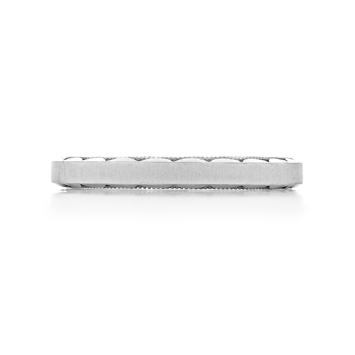 Profile view of a Tacori Sculpted Crescent | Wedding Band - 105-3WS in white gold, featuring a silver-toned metal finish and a textured, scalloped edge pattern.