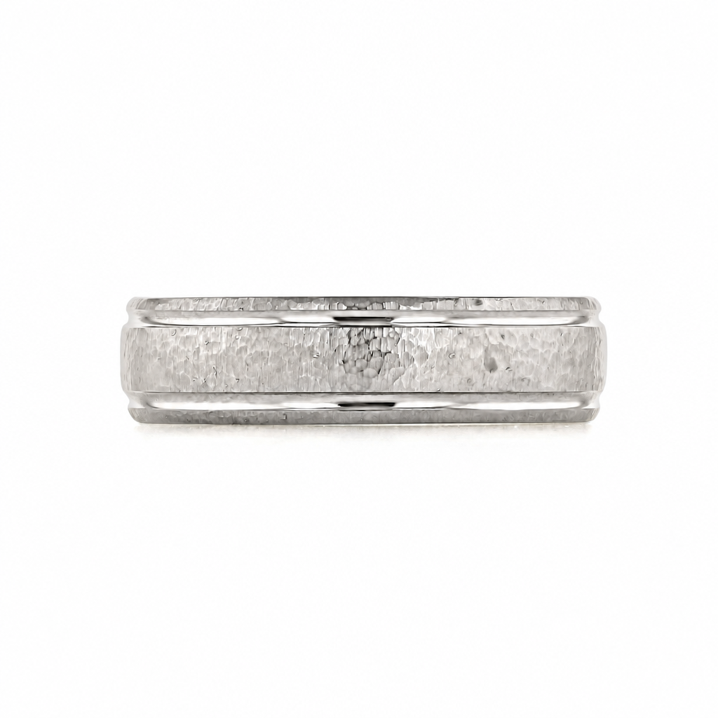 Icing On The Ring Hammered Wedding Band 11-8856Y: a silver-toned platinum men’s band with a textured, hammered center and smooth, raised edges.