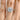 Simply Tacori | Round with Cushion Bloom Engagement Ring - 2677CU8 featuring a round diamond with a cushion-shaped pavé halo on a thin, diamond-accented platinum cathedral band, worn on a finger.
