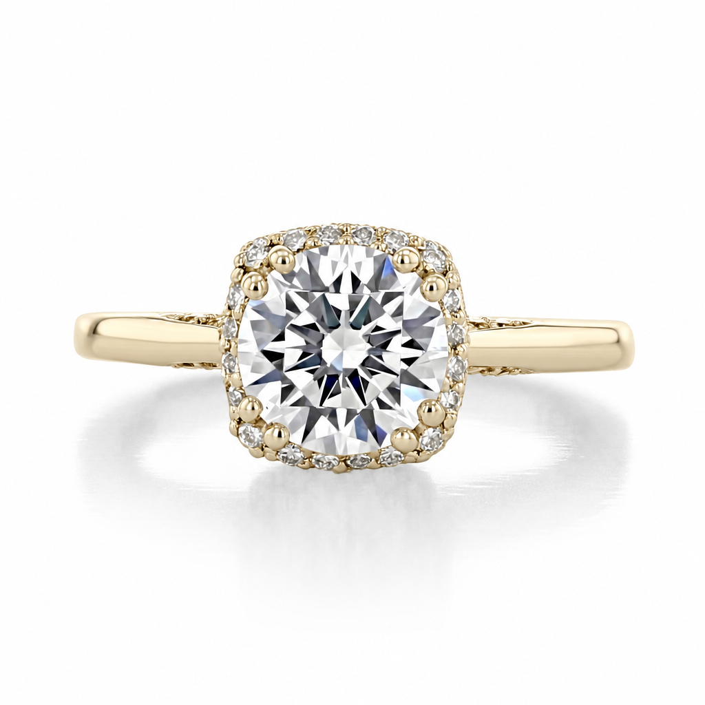 A gold Dantela | Round Bloom Engagement Ring - 2620RDMDY featuring a round-cut center diamond surrounded by a cushion-shaped halo of pavé-set diamonds.
