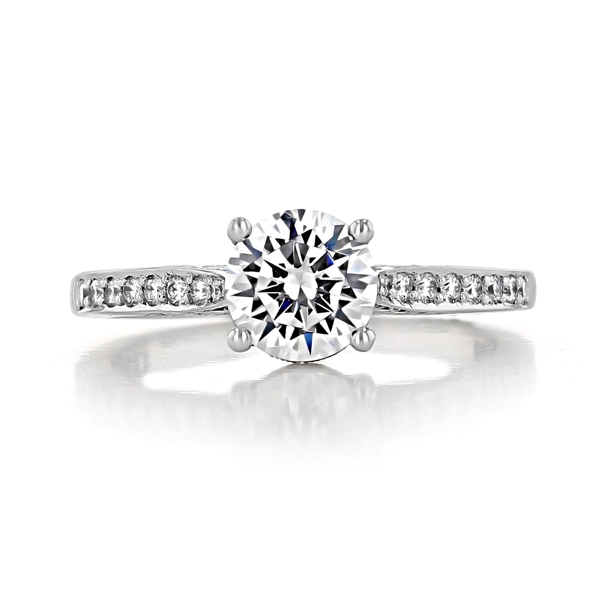Dantela | Round Solitaire Engagement Ring - 2638RDP65 with a round diamond and pavé diamond band on a white background.