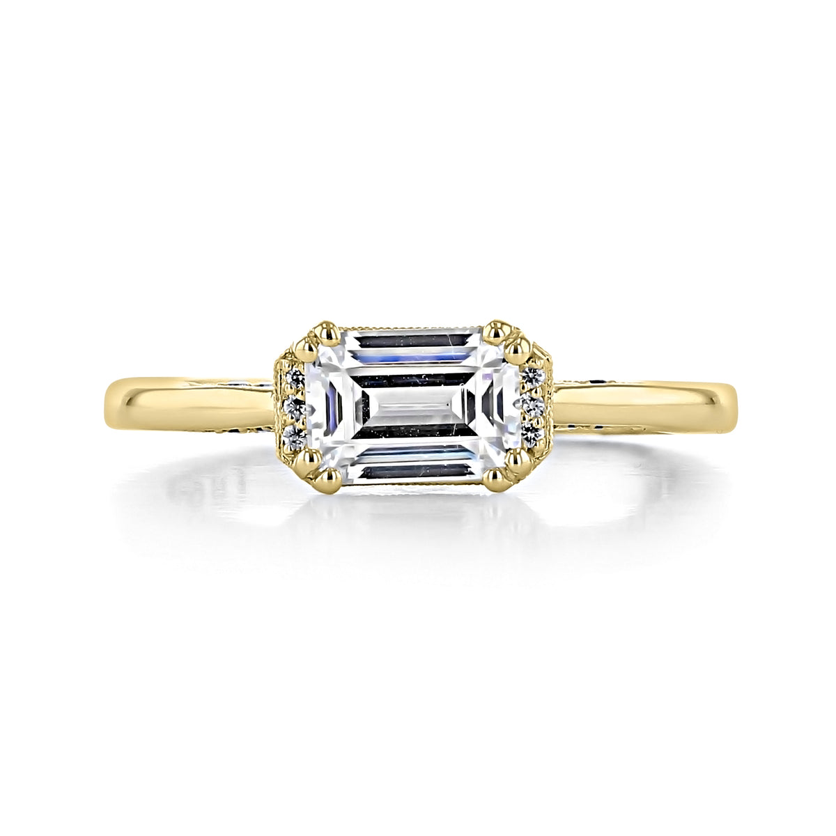 Simply Tacori Emerald Semi-Bloom Engagement Ring 2654EC7X5Y in yellow gold featuring an emerald-cut center stone surrounded by a delicate milgrain halo of small round diamonds.