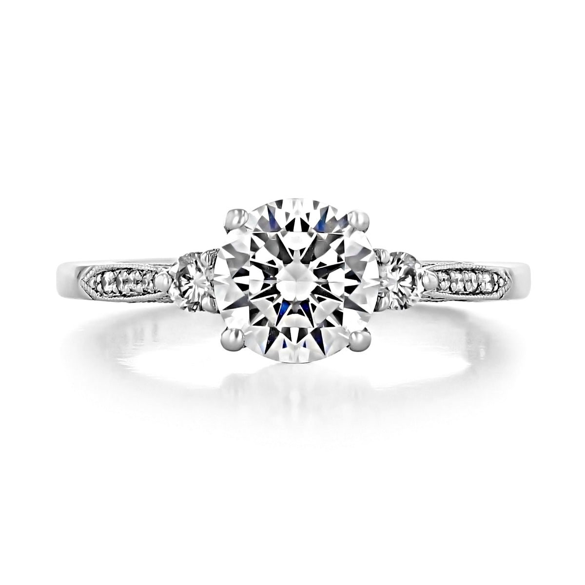 Simply Tacori | Round 3-Stone Engagement Ring - 2657RD7 featuring a round center stone and pave-set diamonds along the metal band.