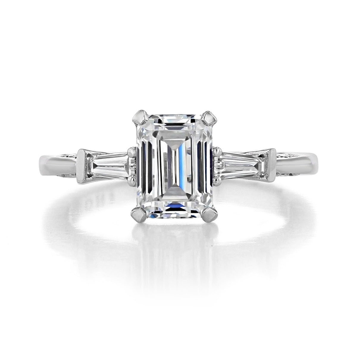 Simply Tacori Emerald 3-Stone Engagement Ring - 2669EC75X55W featuring a rectangular emerald-cut center diamond flanked by two tapered baguette-cut side stones on a silver-colored band.