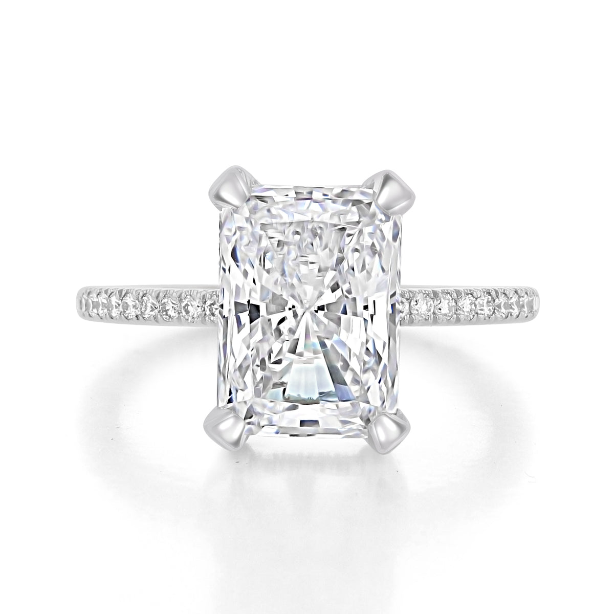 A Simply Tacori Emerald Solitaire Engagement Ring - 267015EC11X8 featuring a radiant-cut diamond center stone on a pavé-set diamond band.