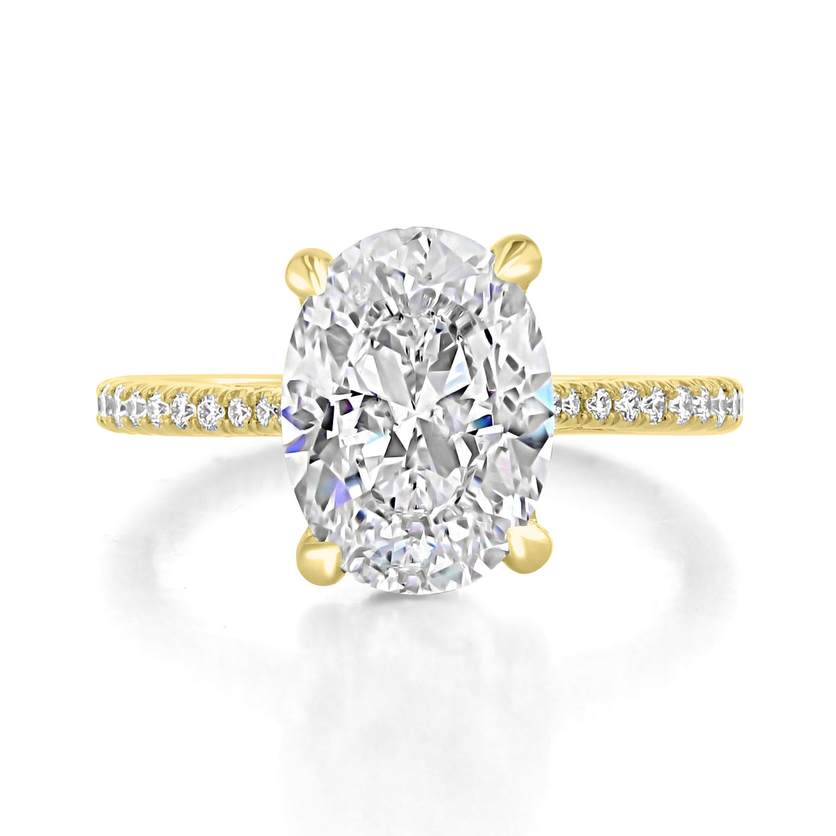 Simply Tacori | Oval Solitaire Engagement Ring - 2671OV115X85Y featuring an oval-cut stone on a yellow gold band accented with pavé diamonds.