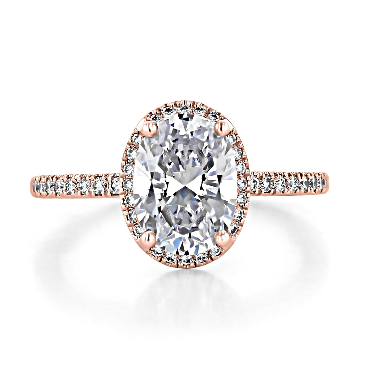 Simply Tacori | Oval Bloom Engagement Ring - 267615OV95X7PK in 18k rose gold featuring an oval-cut center diamond surrounded by a diamond halo, with additional diamonds set along the band.