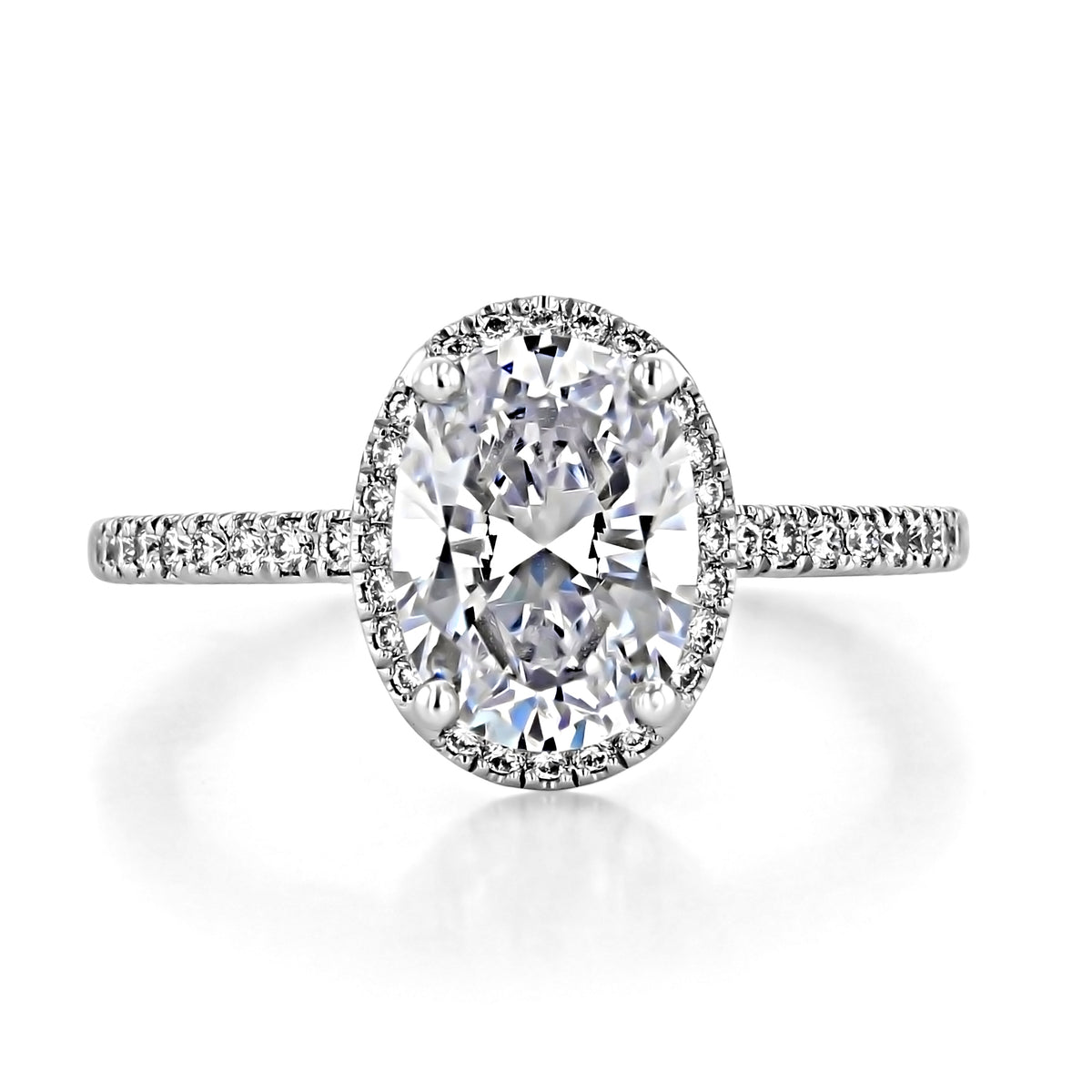 Simply Tacori | Oval Bloom Engagement Ring - 267615OV95X7W, an oval-cut engagement ring in 18k white gold featuring a cushion-shaped bloom halo setting and pavé-set diamonds on the band.