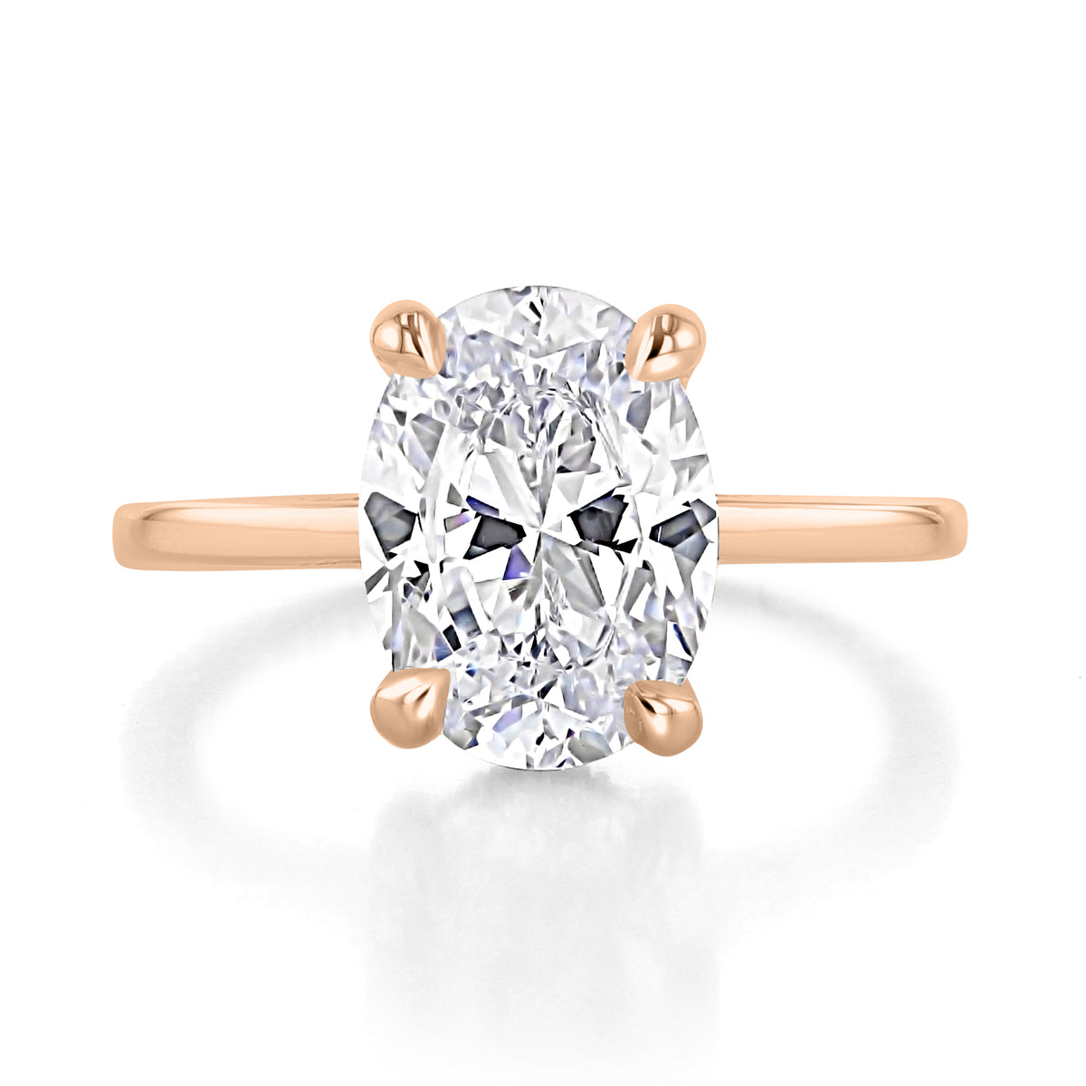 Simply Tacori | Oval Solitaire Engagement Ring - 268815OV115X85PK featuring an oval-cut stone, a rose gold band, and a four-prong setting.