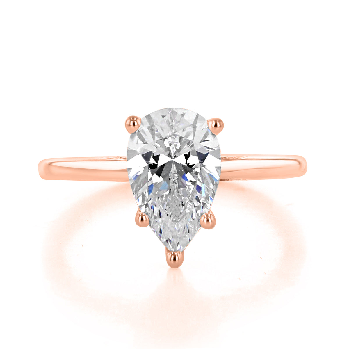 A Simply Tacori | Pear Solitaire Engagement Ring - 268815PS11X7PK featuring a pear-shaped diamond solitaire set on a thin rose gold band.