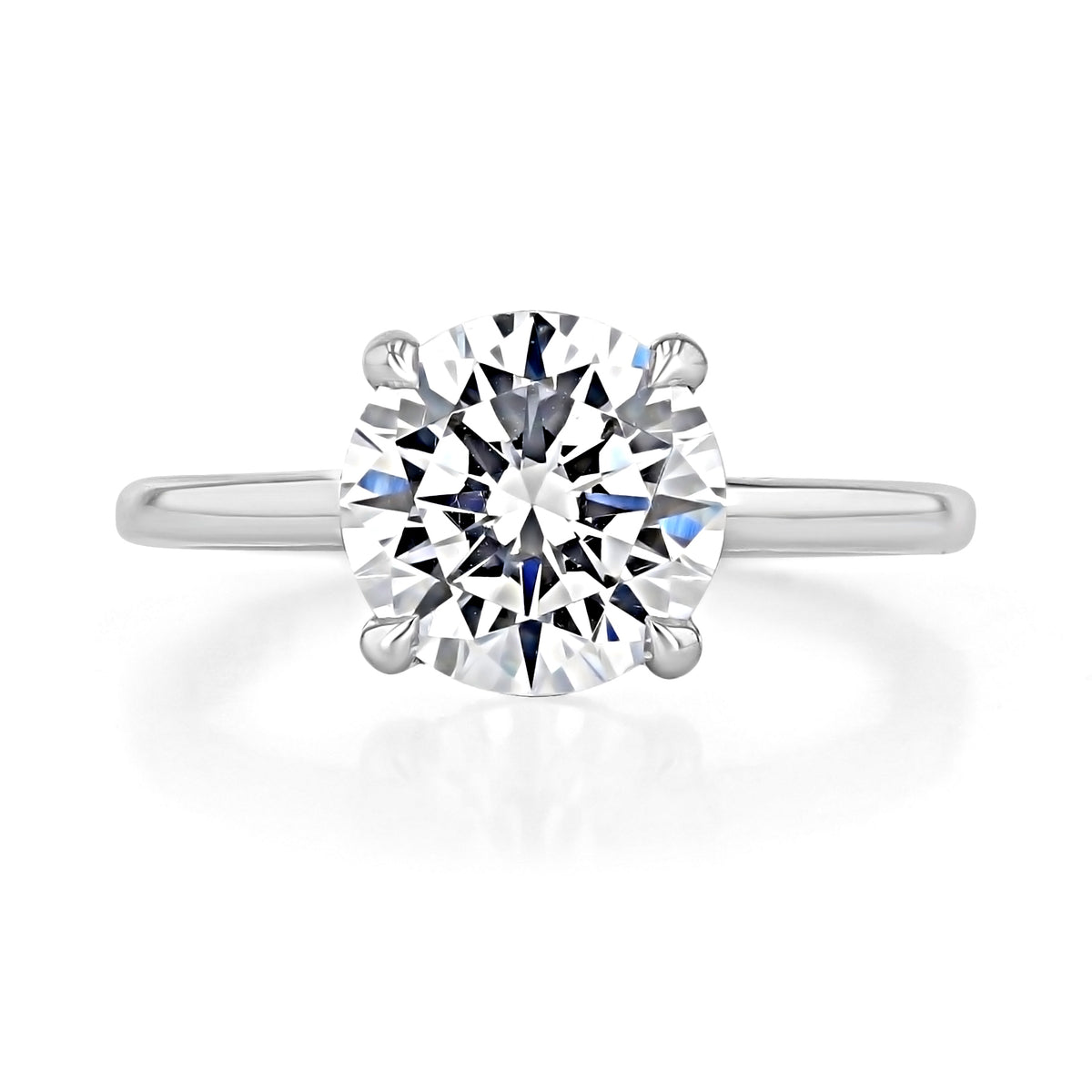 Simply Tacori | Round Solitaire Engagement Ring - 268815RD9W featuring a round-cut diamond in a four-prong setting on a smooth metal band.