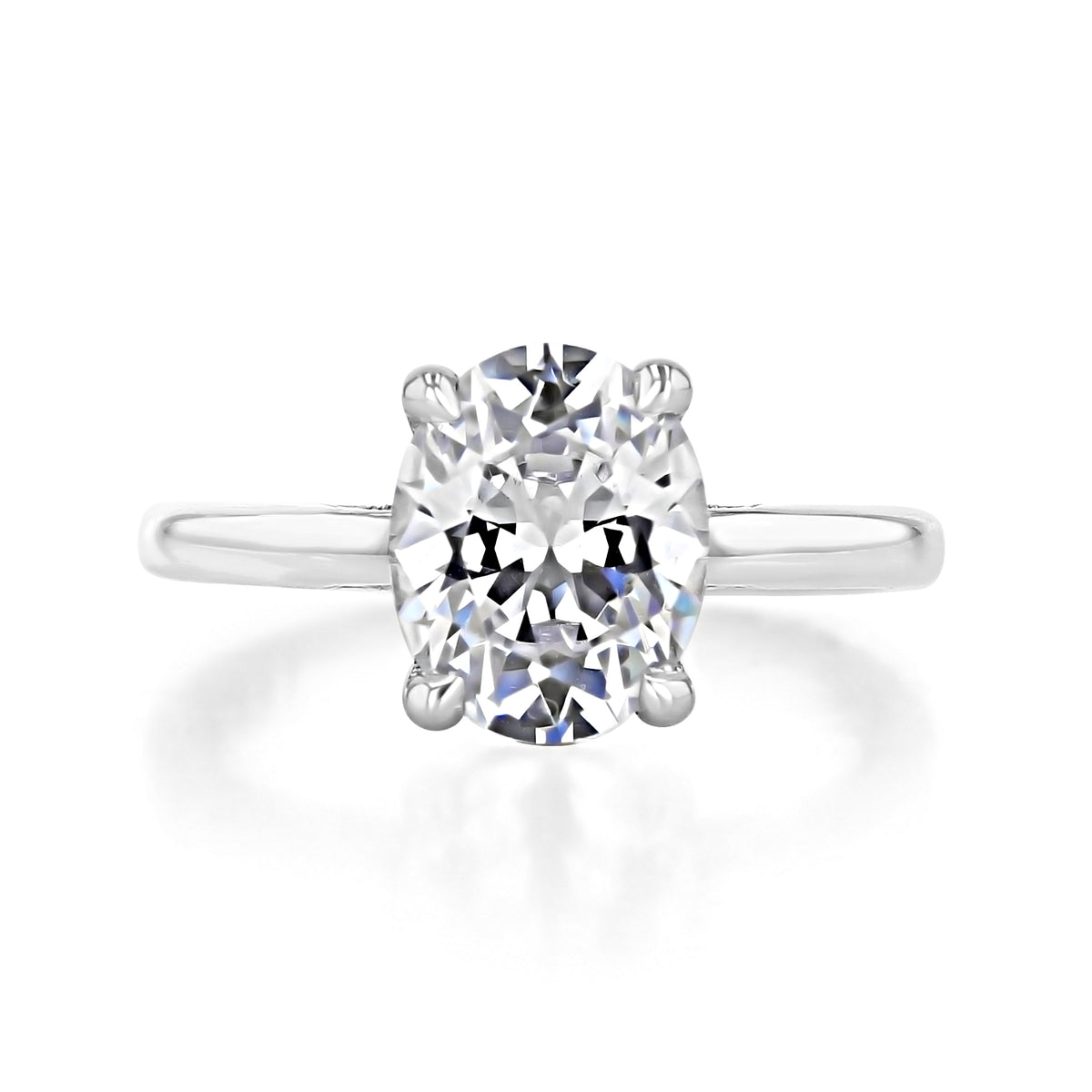 Simply Tacori | Oval Solitaire Engagement Ring - 268822OV10X75 featuring an oval-cut diamond on a plain platinum band with four prongs.