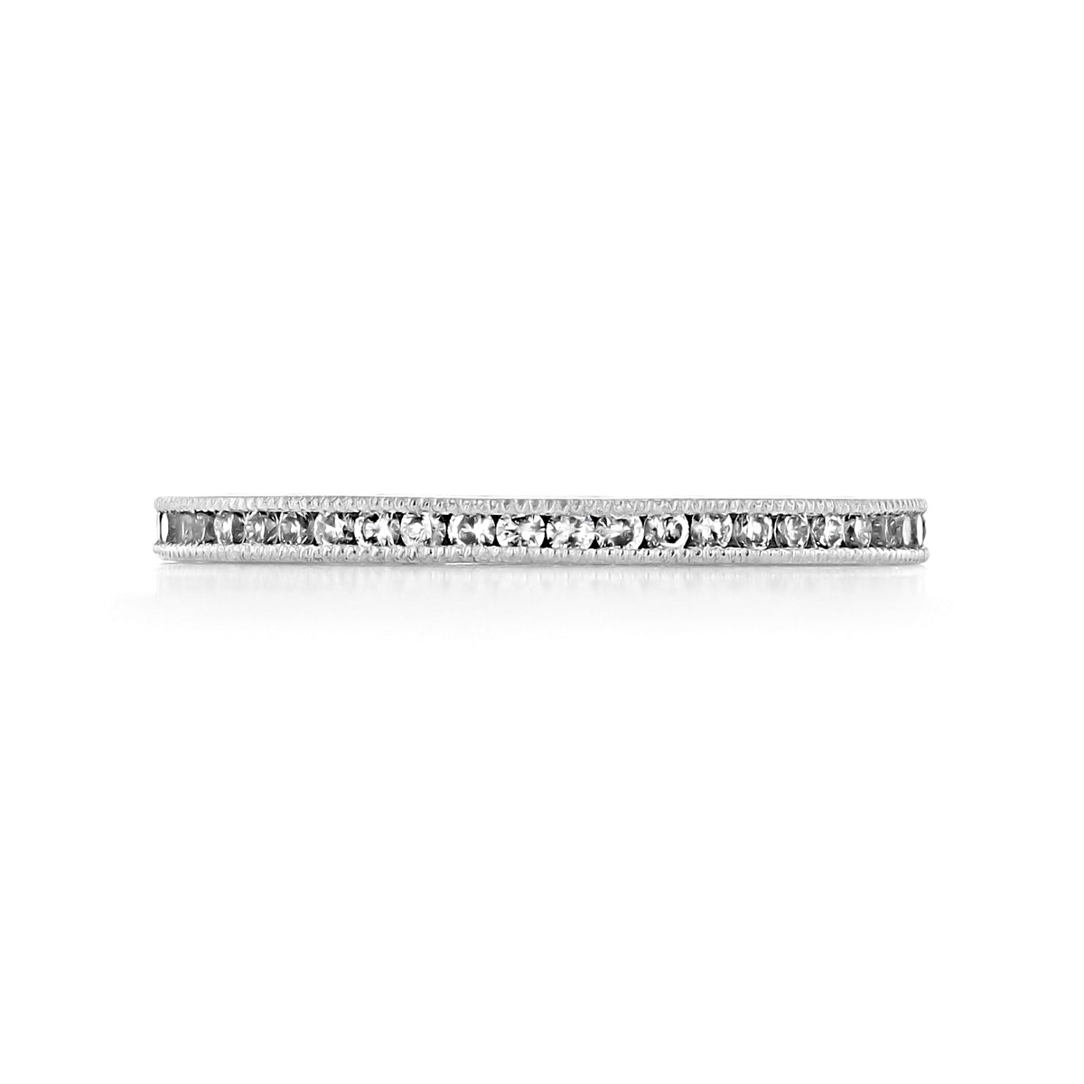 A slim 18k white gold Tacori Sculpted Crescent | Diamond Band - 44-15ETW featuring a row of channel-set diamonds and milgrain edging.