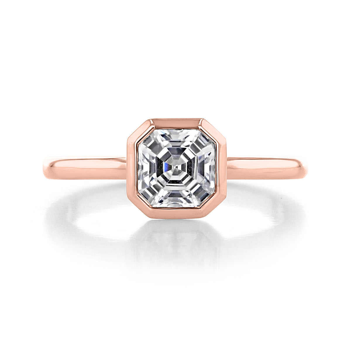 Danhov Per Lei | Bezel Engagement Ring - LE100-AS in rose gold featuring an emerald-cut center stone in a bezel setting.