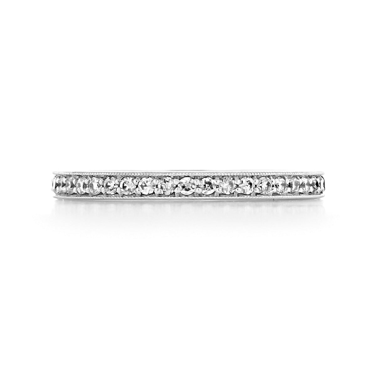 Sierrah 2mm Milgrain Pavé-Set Diamond Wedding Band featuring a thin platinum eternity band with a row of pavé-set diamonds bordered by delicate milgrain detail.