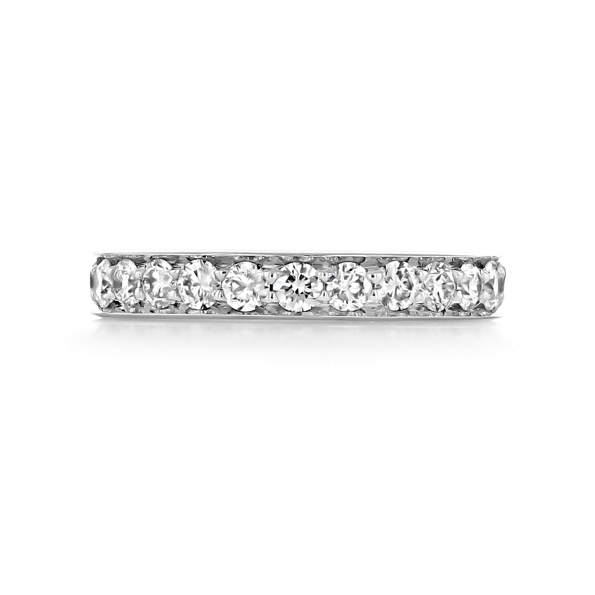 The Sierrah 3.3mm Pavé-Set Diamond Wedding Band is a silver-toned eternity band featuring a row of round pavé-set diamonds.