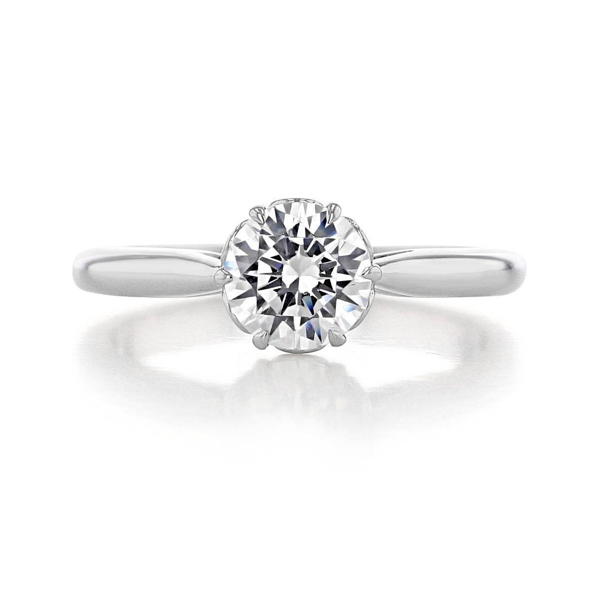 Danhov Classico | 6-Prong Engagement Ring - CL105 featuring a round-cut diamond in a six-prong setting on a plain polished band.