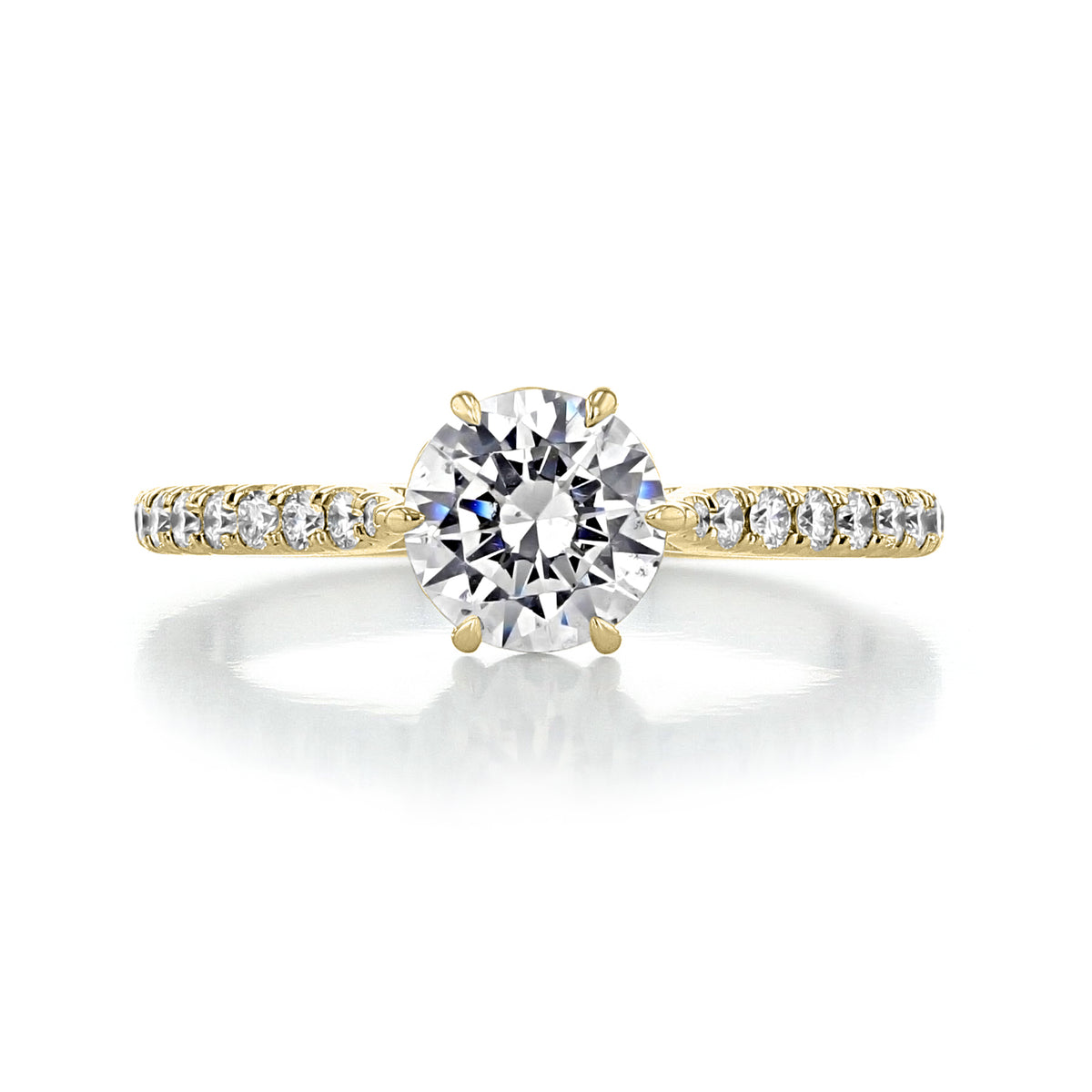Yellow gold Danhov Classico | 6-Prong Engagement Ring - CL108 featuring a round center diamond held by six prongs and a band lined with small stones.