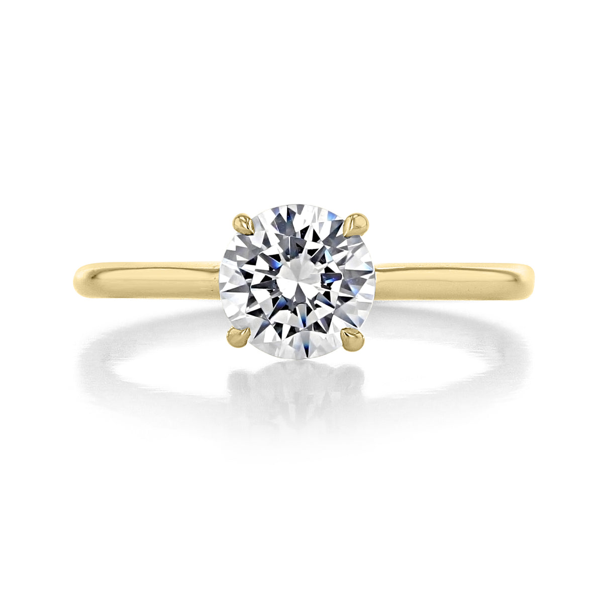 A Classico | Engagement Ring - CL141 by Danhov, featuring a round brilliant-cut diamond solitaire on a plain yellow gold band for a minimalist aesthetic.