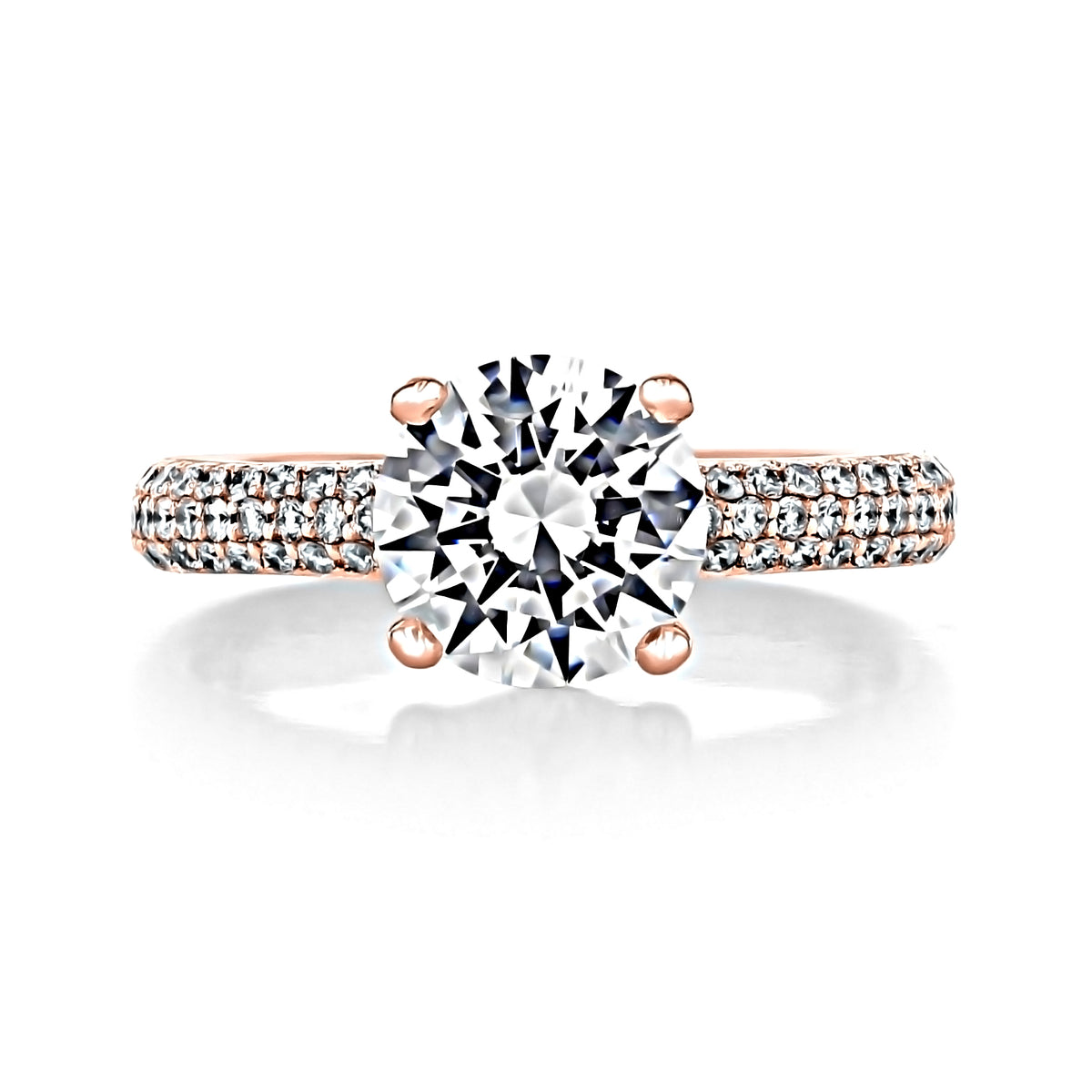Elsa Round Triple Pavé Engagement Ring featuring a round-cut diamond on a triple pavé-set rose gold band.