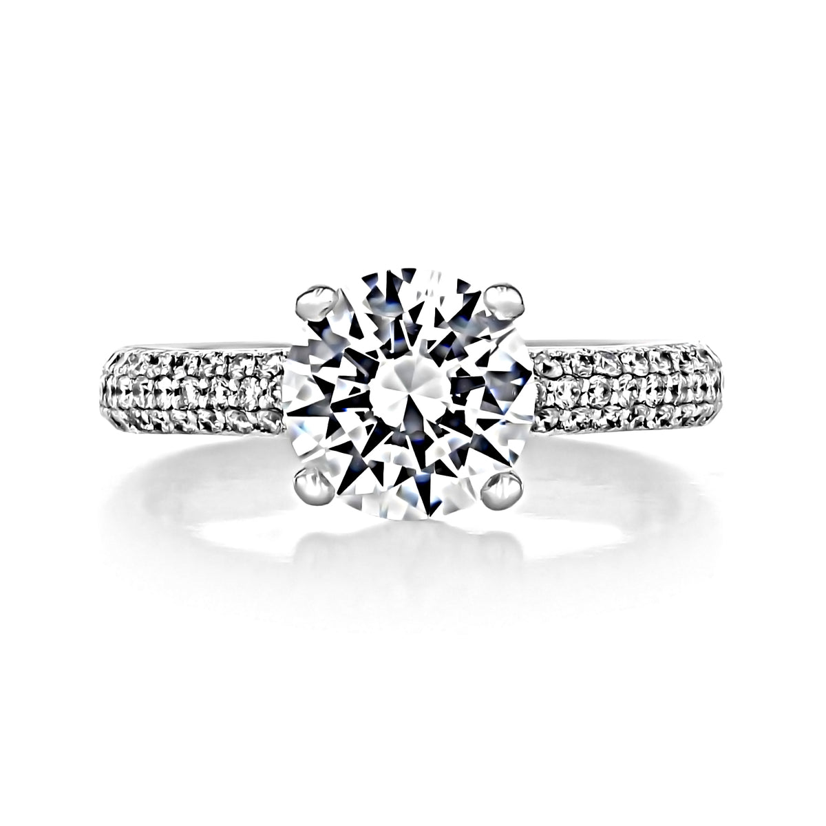 Elsa | Round Triple Pavé Engagement Ring featuring a round-cut center gemstone and a pavé-set band.
