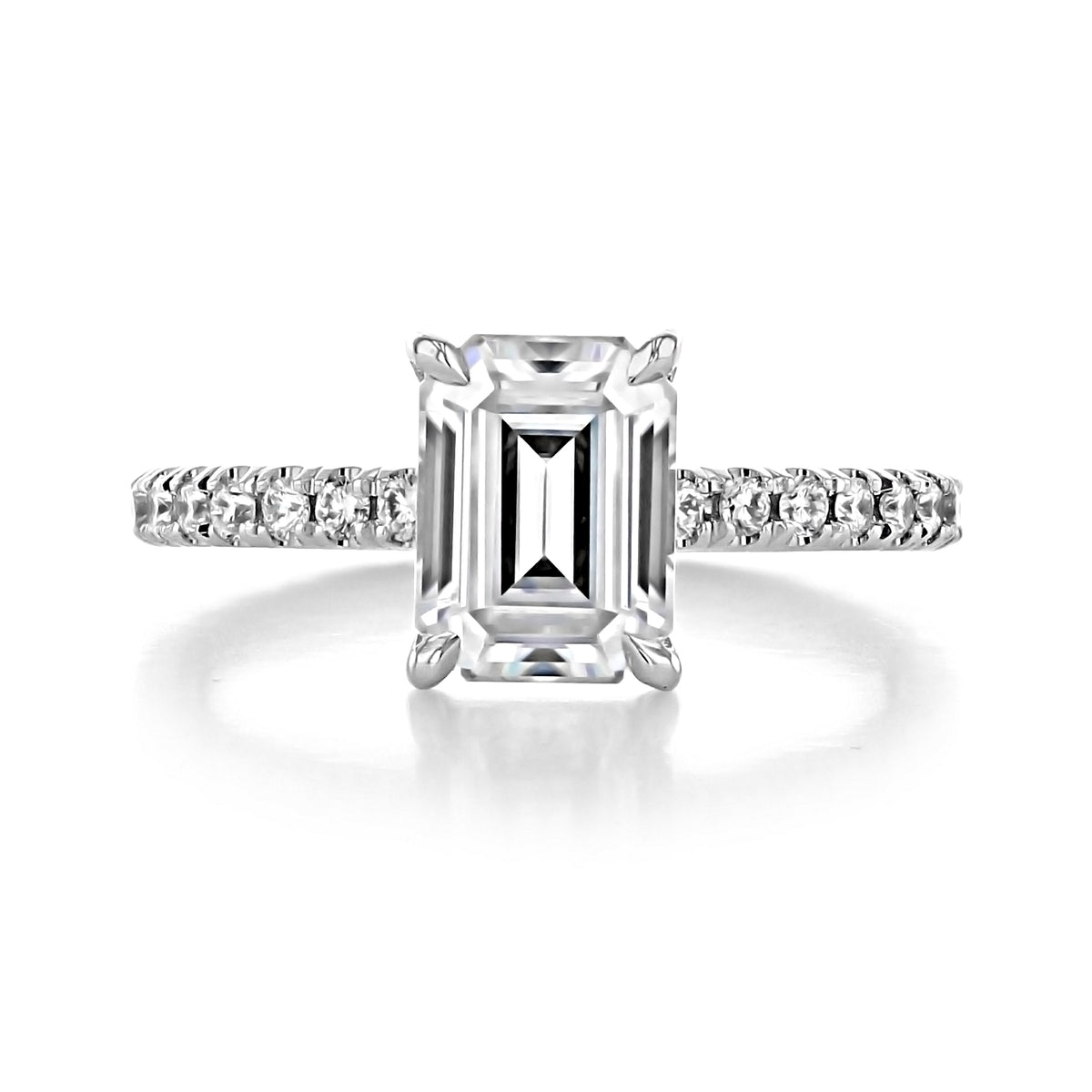 Carthay emerald-cut engagement ring with a micro-prong set pavé diamond band on a white background.