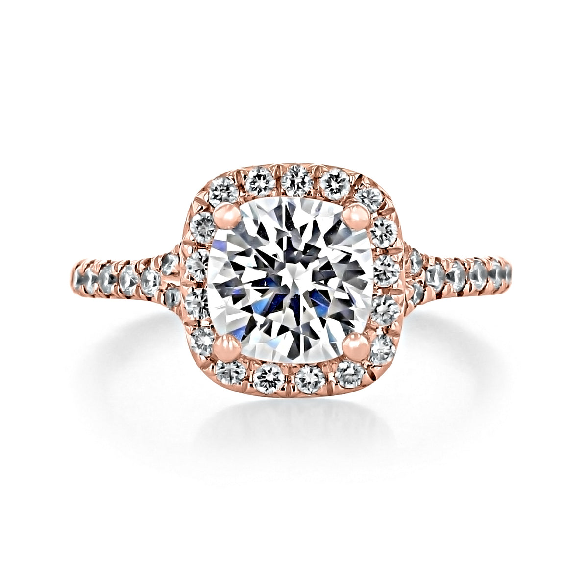 Sonoma | Round Halo Engagement Ring featuring a cushion-cut center diamond surrounded by a round halo on a pavé-set rose gold band.