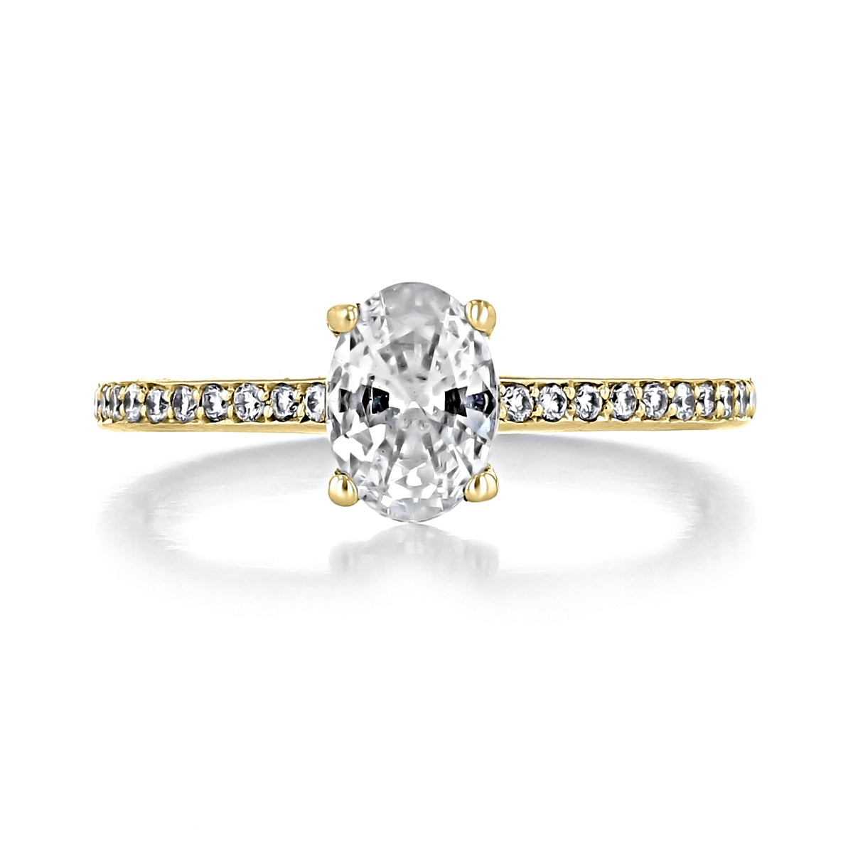 Icing On The Ring Zoe | Oval Pavé Engagement Ring featuring a timeless gold design with an oval-cut center stone and pavé-set diamonds along the band.