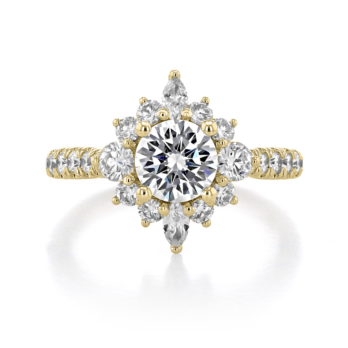 Astor | Halo Engagement Ring by Gabriel & Co. featuring a gold celestial design with a large round center diamond surrounded by a sunburst pattern of micro-prong set round and marquise-cut stones.