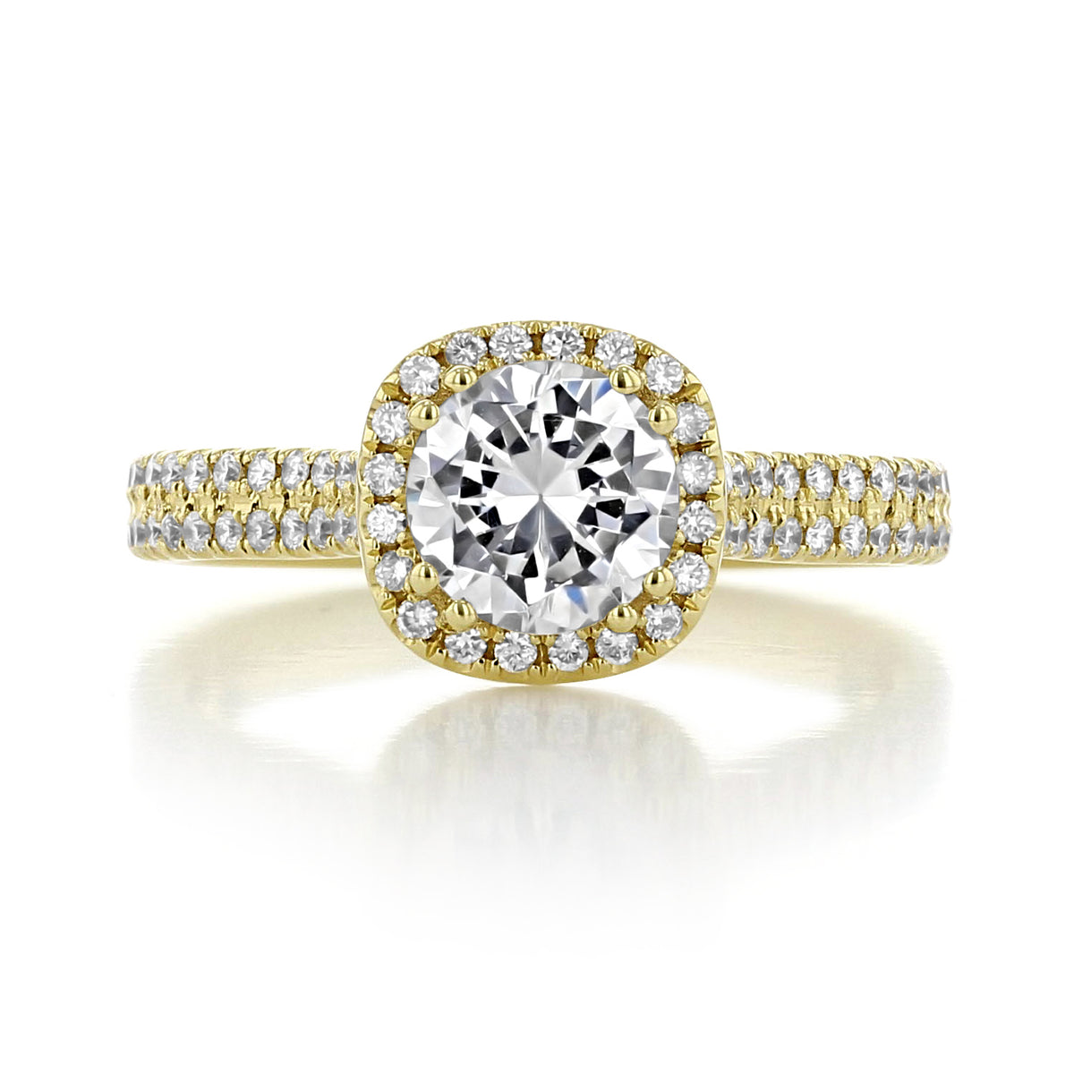 Zuma | Round Halo Engagement Ring featuring a gold band with a round center diamond in a cushion halo setting and a pavé-set split shank.