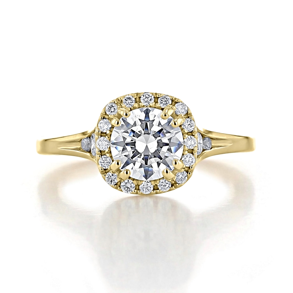 Renee Round Halo Engagement Ring featuring a round-cut Evertrue diamond in a halo setting on a gold band with small spotlight diamonds.