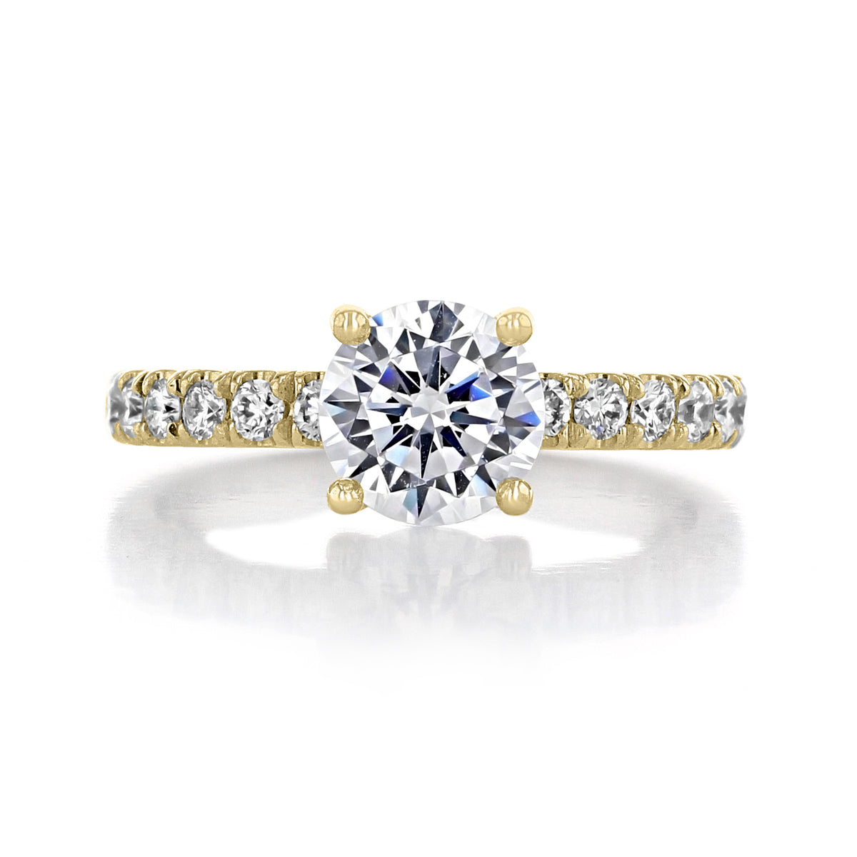 Cambria | Round Micro-Prong Engagement Ring in gold, featuring a round evertrue diamond and smaller round diamonds in a micro-prong setting along the band.