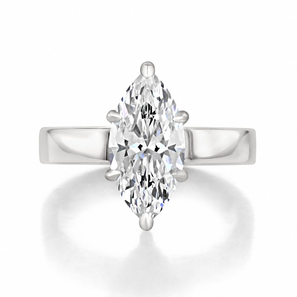 Selena | Marquise Flat-Top Solitaire Engagement Ring in 14k white gold, top view of a marquise center diamond on a wide flat band.