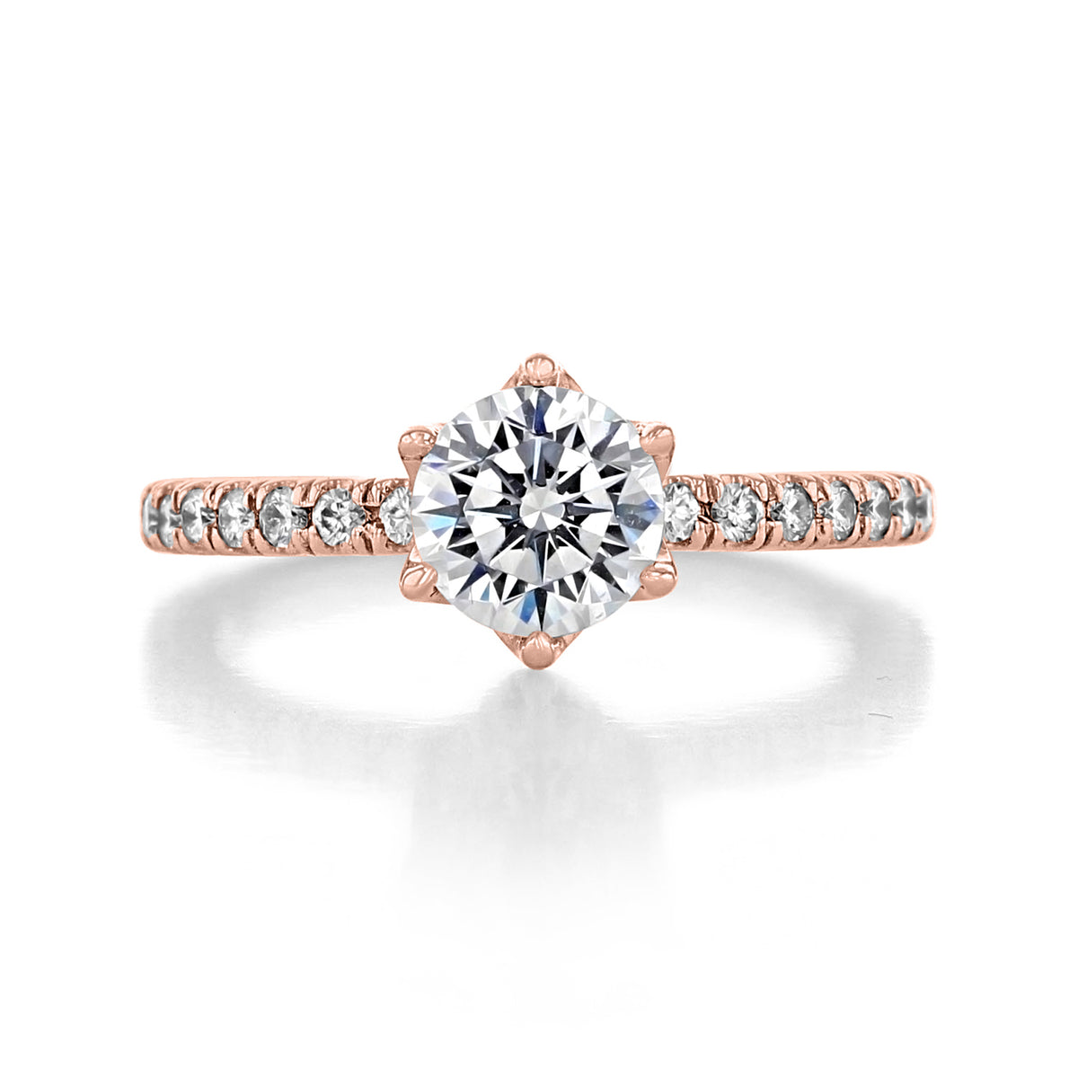 Rosalia | Round Micro-Prong Engagement Ring in rose gold, featuring a round-cut solitaire diamond on a micro-prong pavé band.