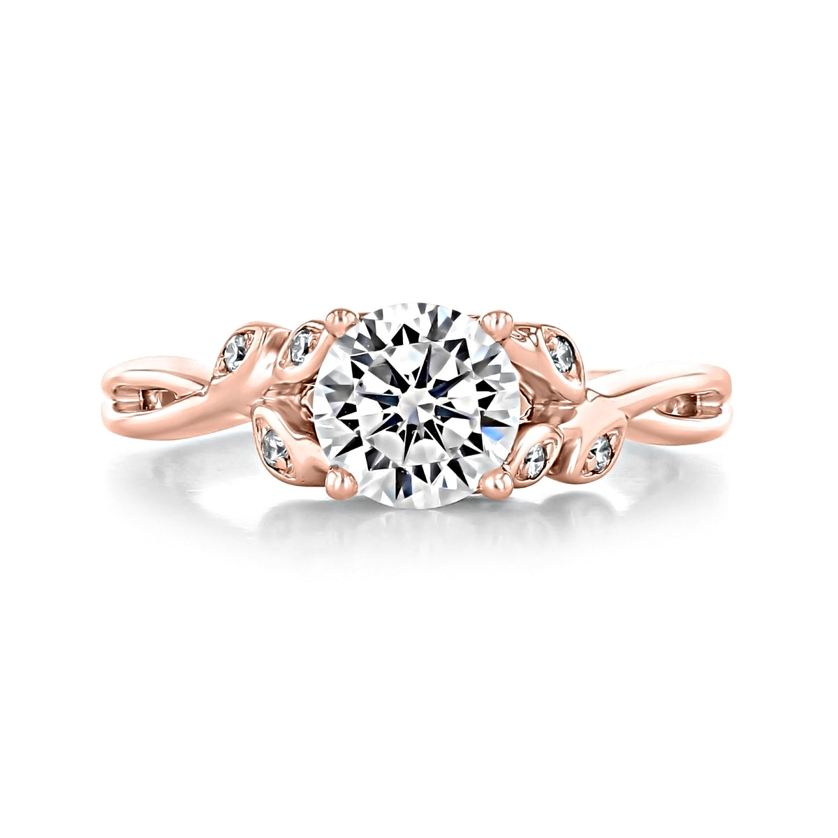 Icing On The Ring Ivy round floral diamond engagement ring in rose gold, featuring a 1-carat round center diamond and leaf-shaped accents set with accent diamonds on the band.