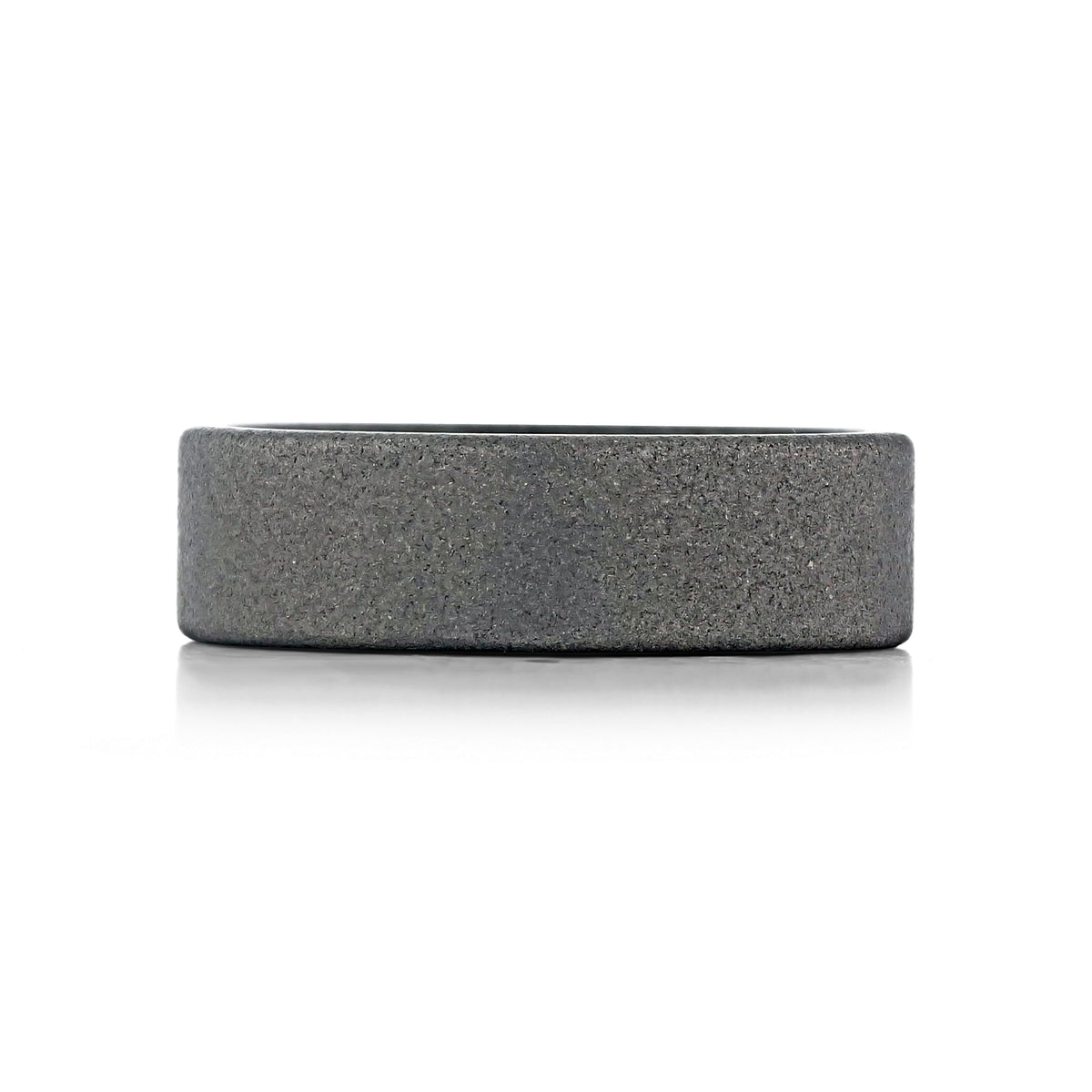 Raw Tungsten Carbide 7mm Men’s Wedding Band | FG98 featuring a flat-edged design with a dark, raw finish gray surface.