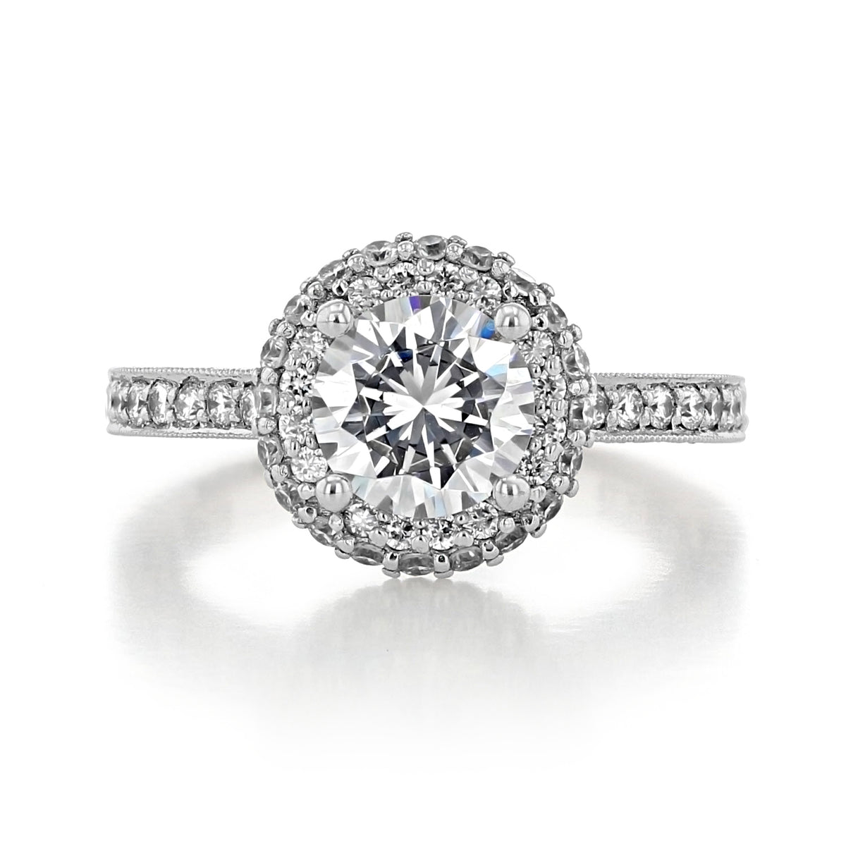 Tacori Blooming Beauties | Round Bloom Engagement Ring - HT2522RD7 with a round-cut diamond, halo, and pavé-set diamond band.