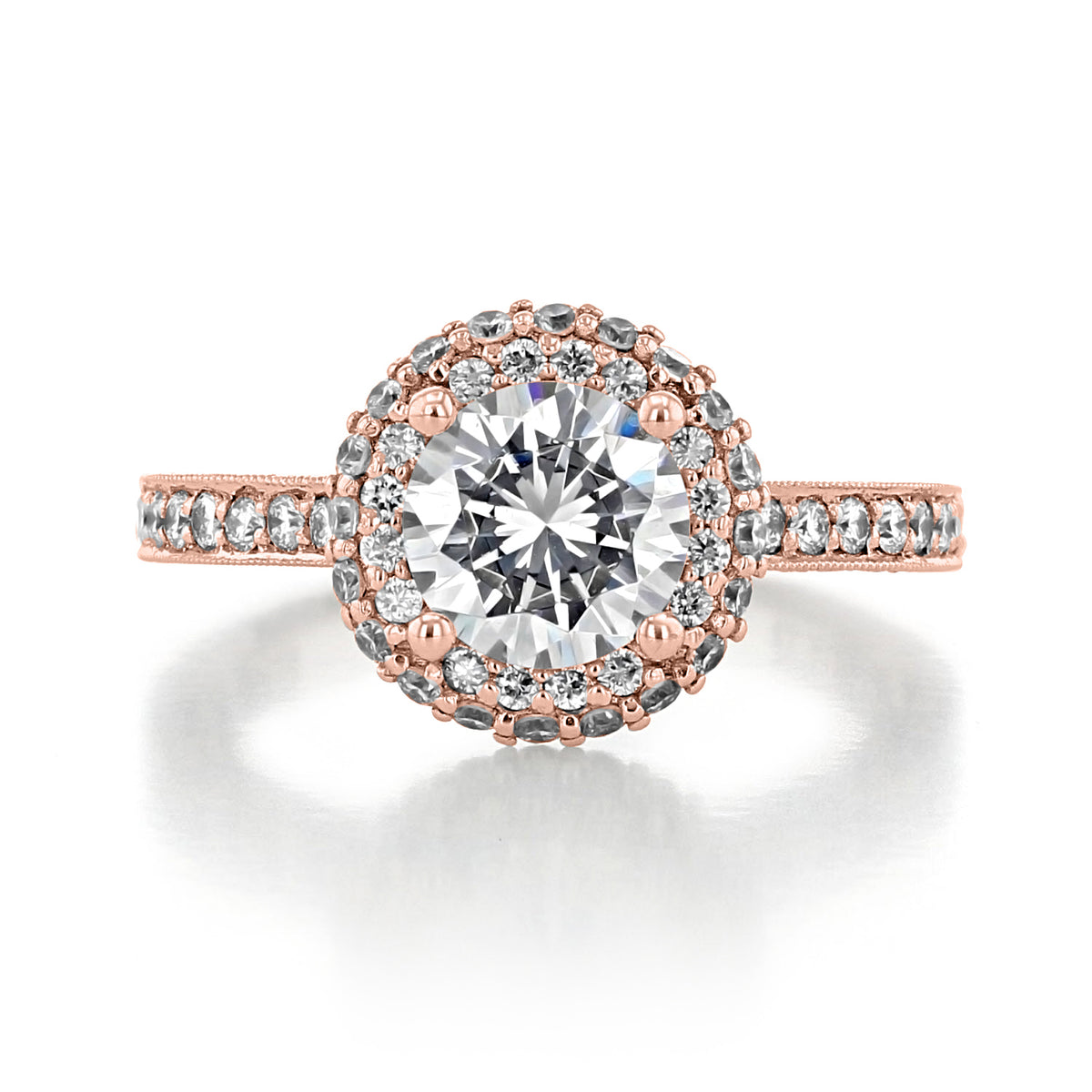 A Tacori Blooming Beauties | Round Bloom Engagement Ring - HT2522RD7PK featuring a round brilliant center diamond in a halo setting on a rose gold band with pavé-set diamonds.