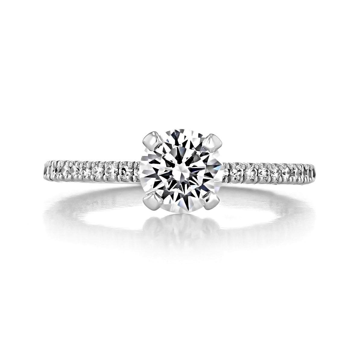 A round diamond Petite Crescent | Round Solitaire Engagement Ring - HT254515RD65 featuring a pavé-set Tacori band on a white background.