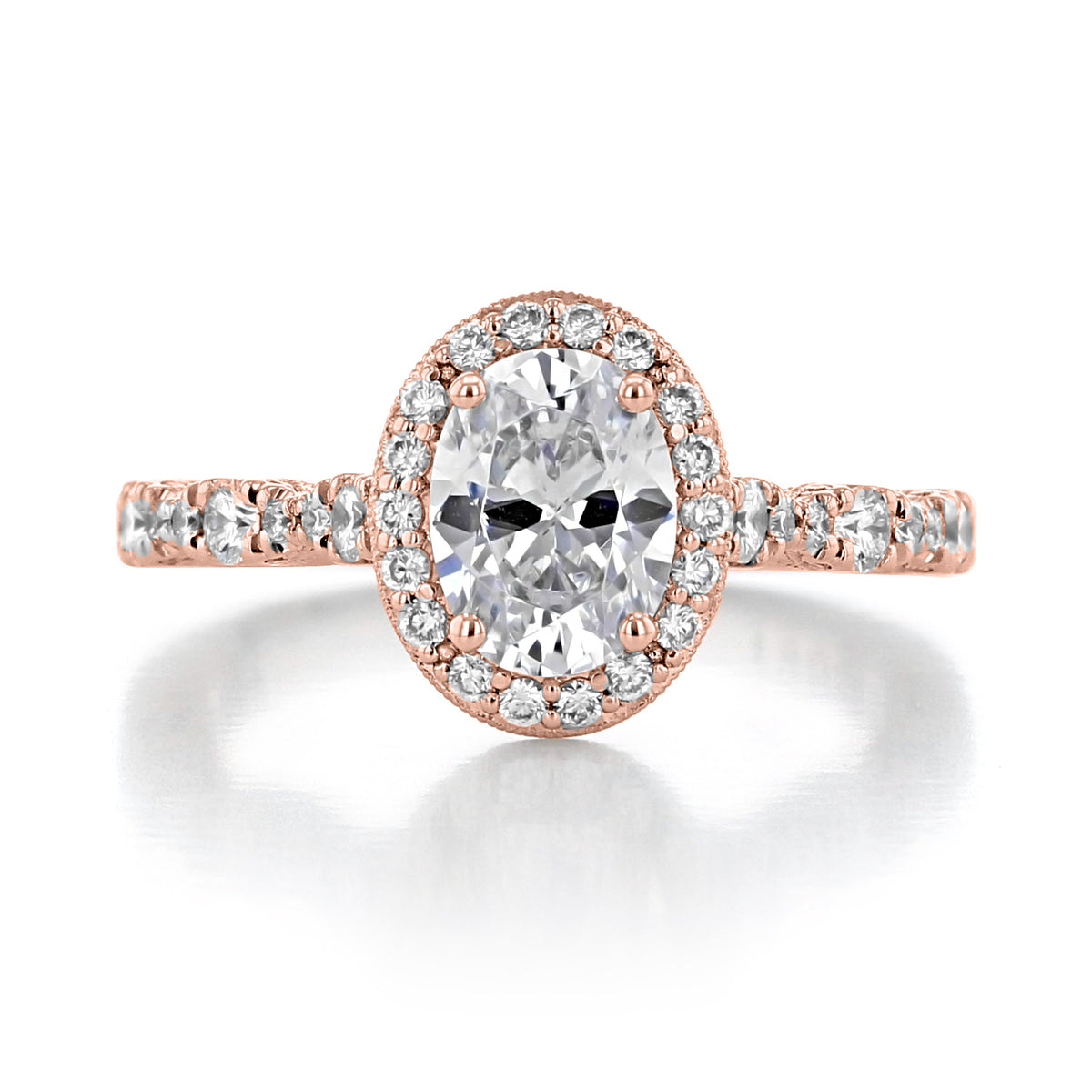 Tacori Petite Crescent | Oval Solitaire Engagement Ring - HT2560OV8X6PK in rose gold, featuring an oval-shaped diamond center surrounded by a halo of smaller stones on a pavé-set band.