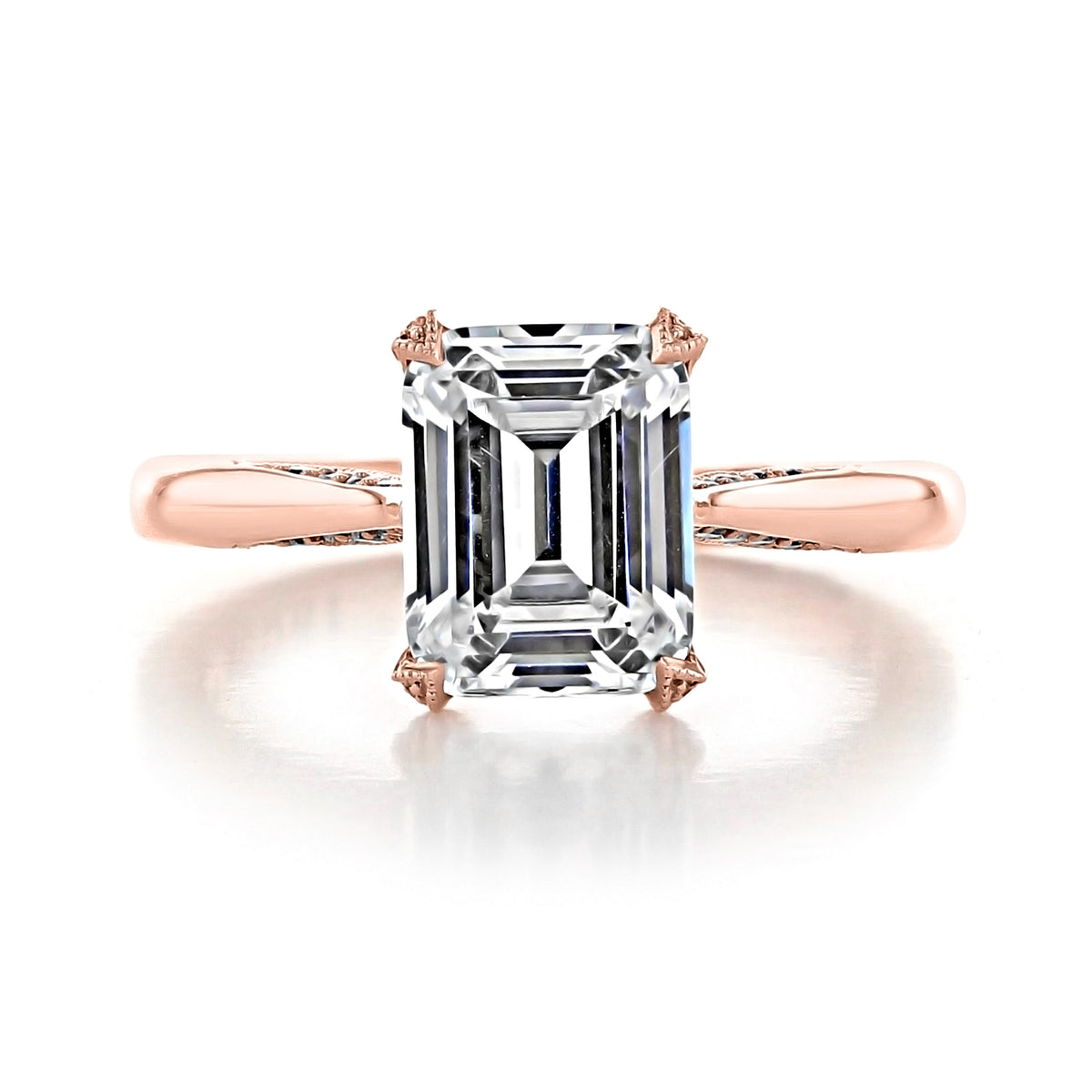 A Royal T | Emerald Solitaire Engagement Ring - HT2625EC9X7PK featuring an emerald-cut diamond set on a rose gold band.