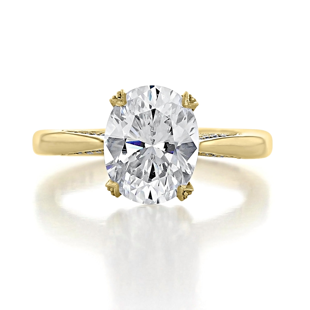 Tacori RoyalT | Oval Solitaire Engagement Ring - HT2625OV10X8Y featuring an oval-cut diamond on a yellow gold band with hidden diamond accents on the sides.