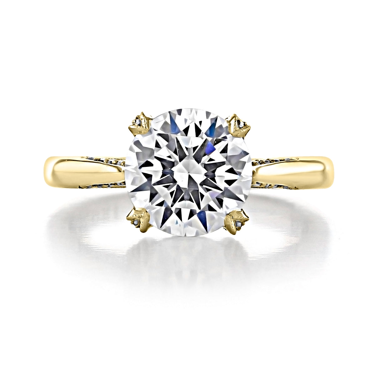 A 3 carat RoyalT | Round Solitaire Engagement Ring - HT2625RD9Y featuring a round solitaire diamond on a yellow gold band with a four-prong setting and hidden diamond accents.