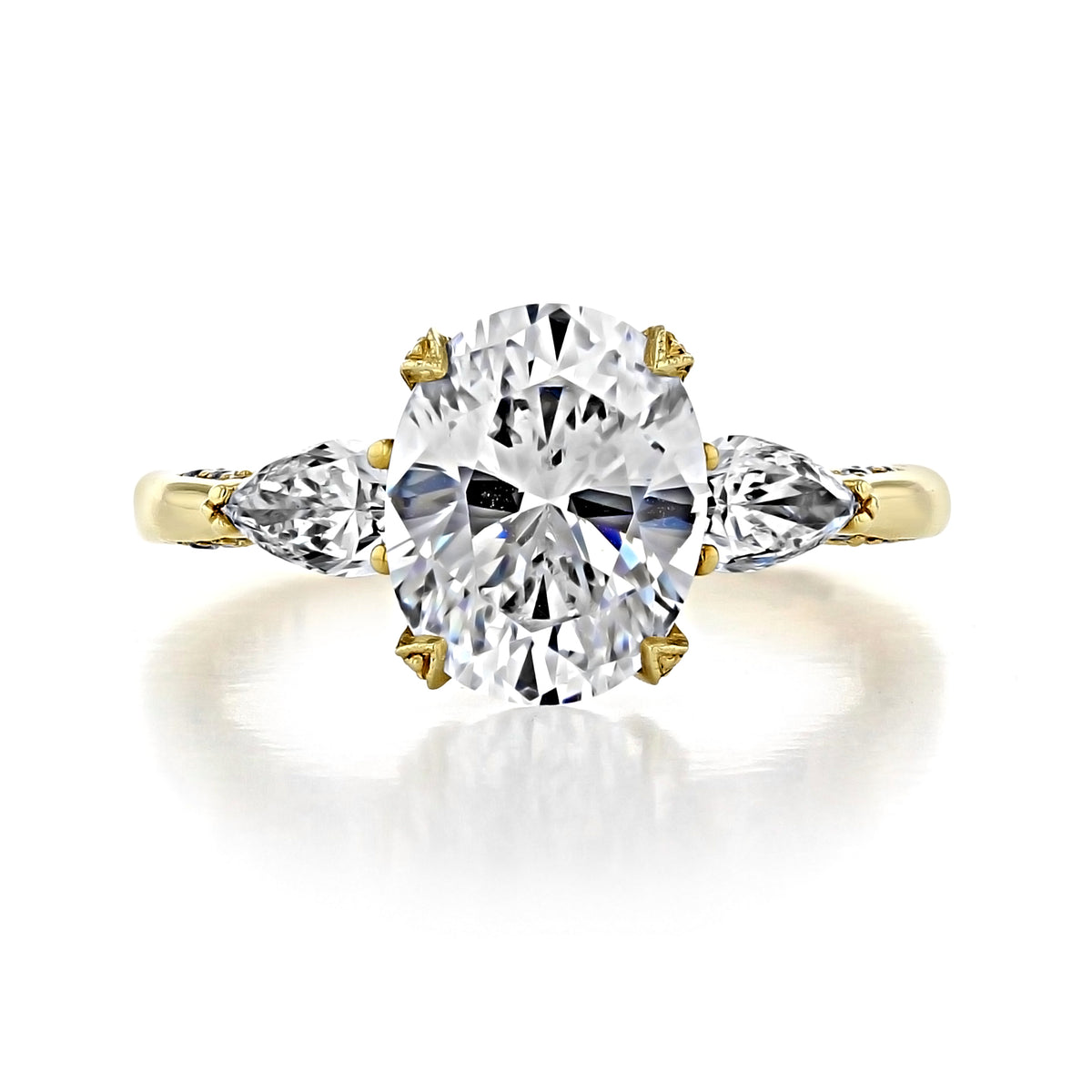Tacori Royal T | Oval Solitaire Engagement Ring - HT2628OV10X8Y featuring an oval center gemstone with two pear-cut side stones on a gold band.