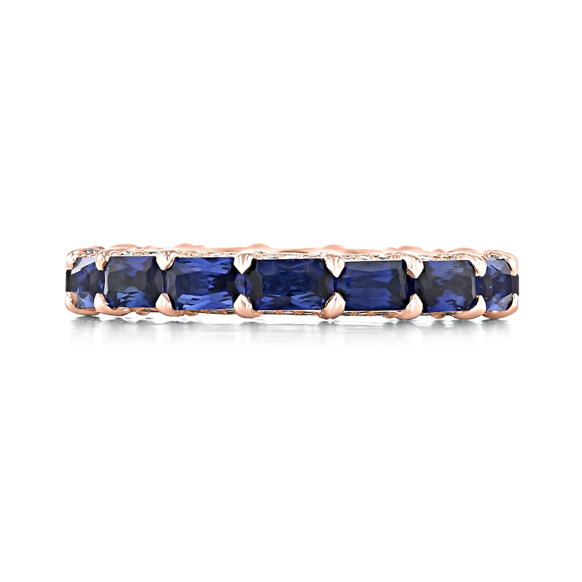 A Tacori RoyalT | Sapphire Eternity Band - HT264865BSPK, set with emerald-cut blue sapphires in a metal setting.