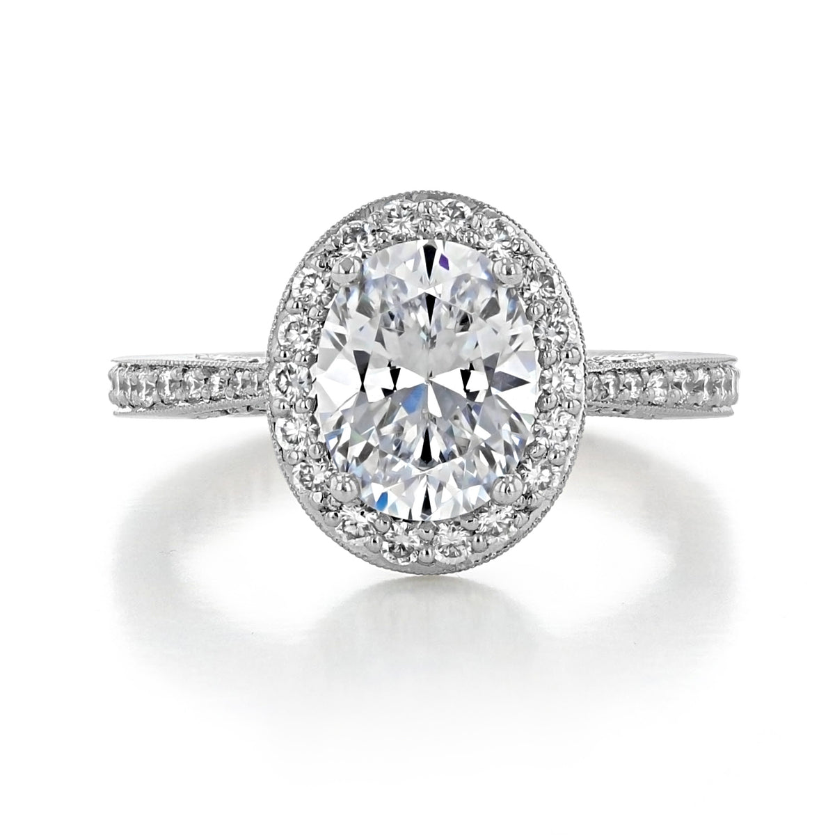 RoyalT | Oval Pavé Engagement Ring - HT2652OV9X7 featuring an oval center stone surrounded by a pavé halo and a diamond-encrusted platinum band.