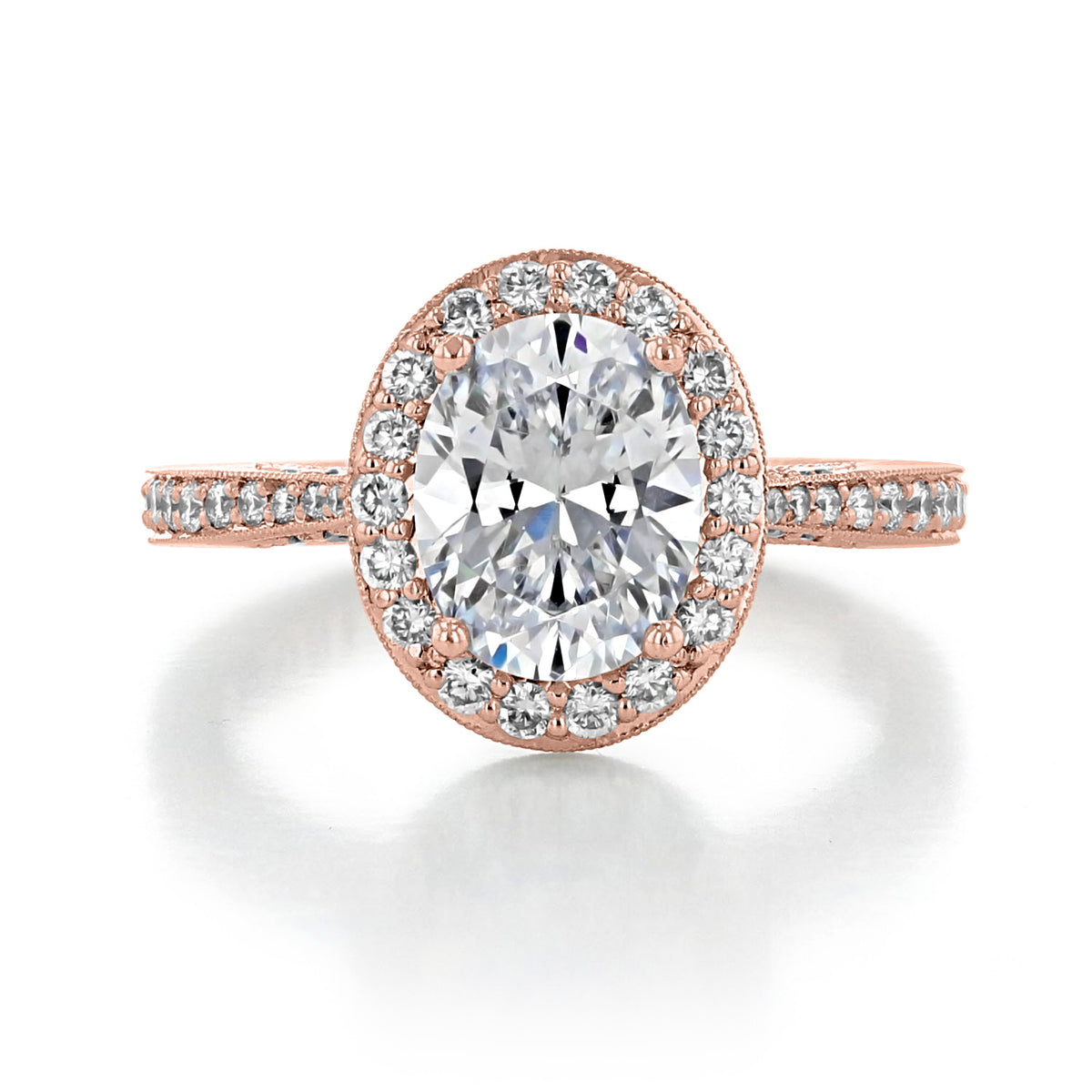 RoyalT | Oval Pavé Engagement Ring - HT2652OV9X7PK with an oval-cut diamond center set in rose gold, featuring a pavé diamond halo and band.